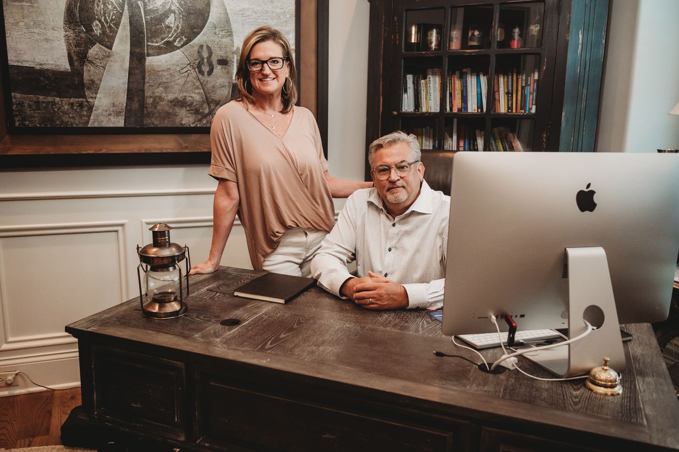 Steve and Melissa Fultz working together at a desk